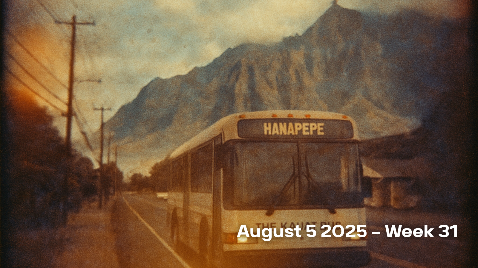 The Kauai Bus with a Hanapepe sign in the front window and double exposure of Nฤ Pali Coast State Wilderness Park