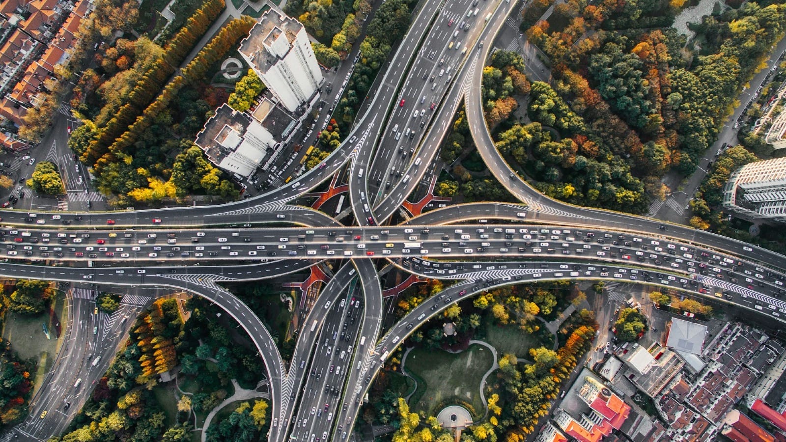 Highway interchange aerial view illustrating AI search traffic pathways and direct traffic flow patterns in digital discovery
